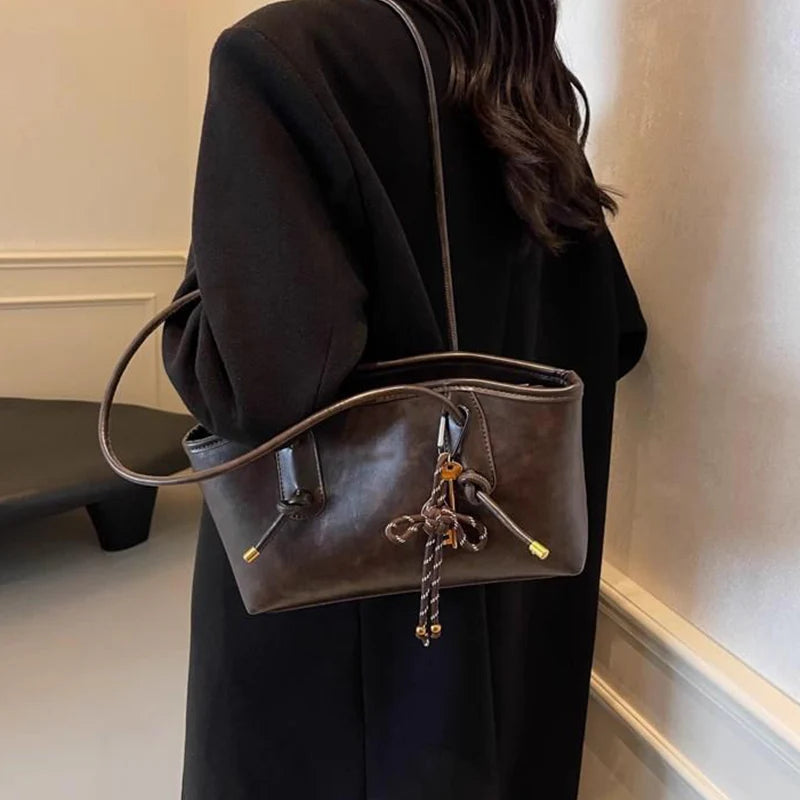 👍2026 Új modell😜30% árcsökkentés👜 Vintage stílusú PU bőr válltáska – Prémium minőség, praktikus és nőies mindennapi kiegészítő!